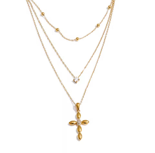 THE TRINITY CROSS NECKLACE